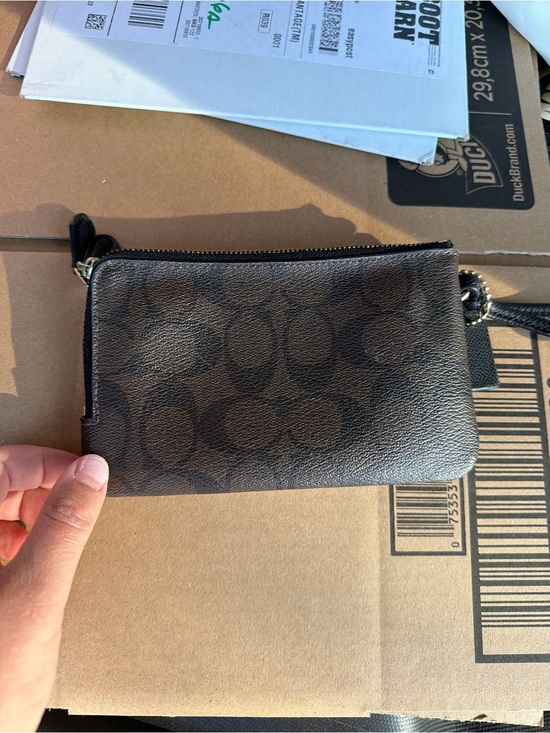 Coach Handbags - Coach Brown/Black Signature Canvas Wristlet